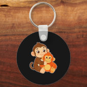Grappige baby aap met knuffel dier tee grafische a sleutelhanger (Voorkant)