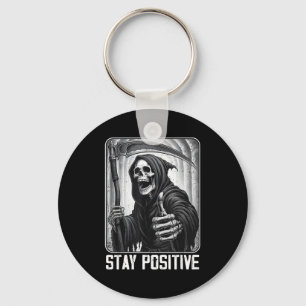 Grappige blijf positief grim reaper skelet schedel sleutelhanger