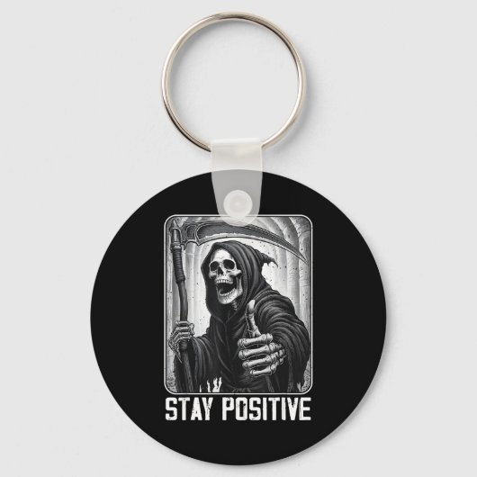 Grappige blijf positief grim reaper skelet schedel sleutelhanger (Voorkant)