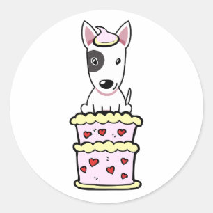 Grappige bull terrier hond springen uit een taart ronde sticker