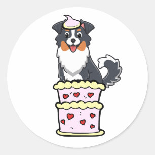 Grappige collie hond springen uit een taart ronde sticker