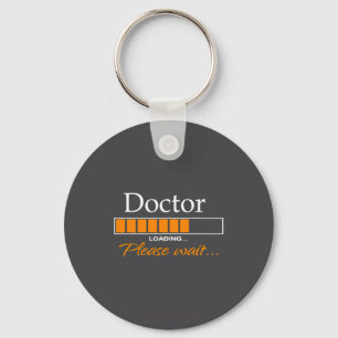 Grappige dokter laadt medisch arts outfit nieuw sleutelhanger