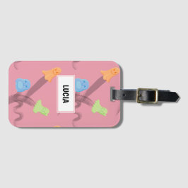 Grappige geesten op roze bagagelabel