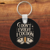 Grappige gotische quote Niet evolueren Cocon Sarca Sleutelhanger (Voorkant)