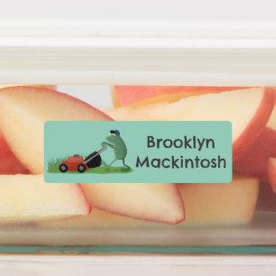 Grappige groene kikker die het gazon maait, gepers labels