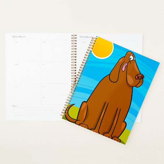 Grappige grote bruine hond zittend in de zon planner