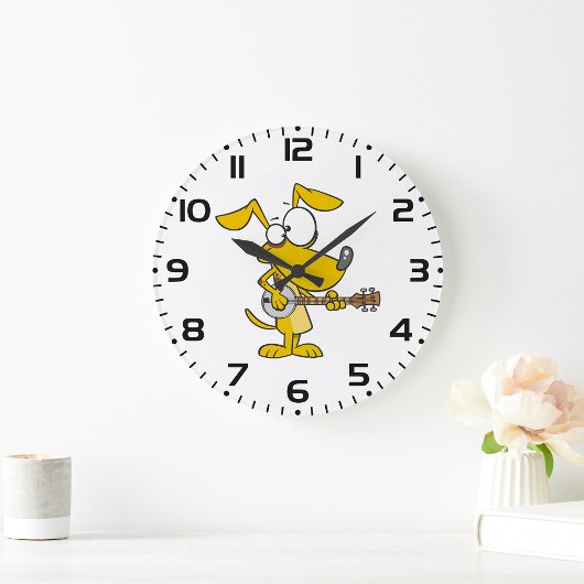 Grappige hond speelt banjo muziek grote klok