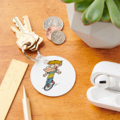 Grappige jongen die eenwieler rijdt sleutelhanger