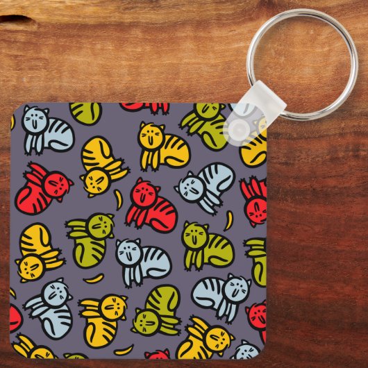 Grappige kat en een gekantelde bloempot sleutelhanger (Achterkant)