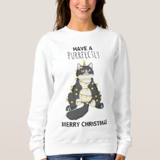 Grappige kat gewikkeld in kerstlichtjes winterhumo trui