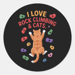 Grappige kat klimt aan binnenmuur voor avontuur ronde sticker