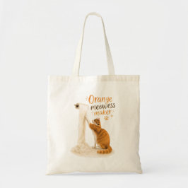 Grappige kat rolt toiletpapier af tote bag