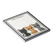 Grappige katten die op een notitieblok gluren (Schuin)