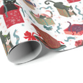 Grappige katten in kerstdozen wit rood groen cadeaupapier (Rol Hoek)