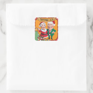 Grappige kerstkarikatuur Ontwerp met een cadeau Vierkante Sticker