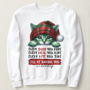 Grappige kerstkat oordeelt je zwijgend trui