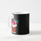 Grappige kerstman zit vast koffiemok (Voorkant links)