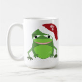 Grappige kikker met een kerstmuts koffiemok (Links)