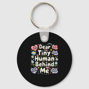 Grappige lieve kleine mens achter me sleutelhanger