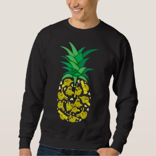 Grappige luiaards bouwen van een ananas fruit trui