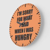 Grappige nieuwigheid het spijt me, hongerig grote klok (Hoek)