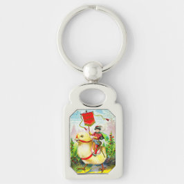 Grappige paasgroeten: ruiter op reusachtige kuiken sleutelhanger