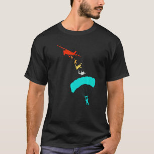Grappige parachutist springt uit het vliegtuig par t-shirt