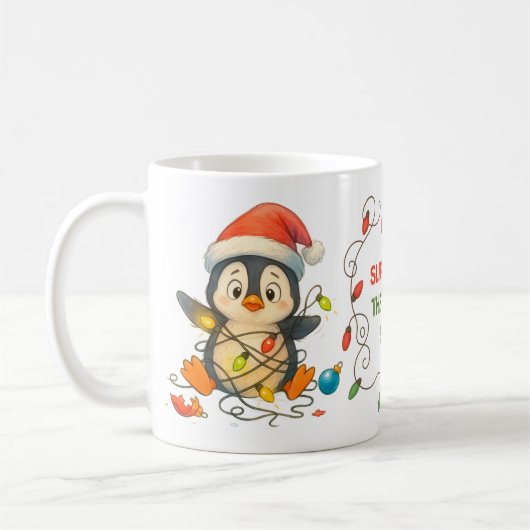 Grappige pinguïn vast in lichtjes mok (Links)