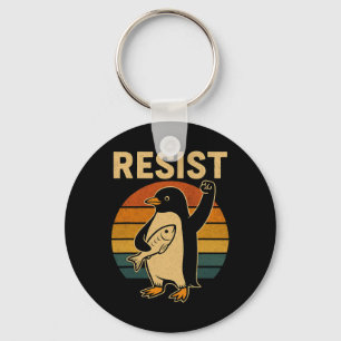 Grappige pinguïn verzet zich tegen pinguïns protes sleutelhanger