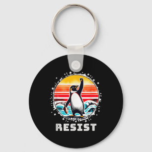 Grappige pinguïn verzet zich tegen pinguïns protes sleutelhanger