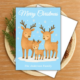 Grappige rendierfamilie in de sneeuw feestdagenkaart