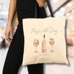 Grappige rosé hele dag wijnliefhebber tote bag<br><div class="desc">Deze heerlijke canvas tas is ideaal voor wijnliefhebbers die genieten van een beetje plezier met hun stijl. Met de speelse zin "Rosé All Day" aan de bovenkant, is het versierd met een charmant waterverf ontwerp van twee wijnglazen en een wijnfles. De stijlvolle scripttypografie voegt een vleugje elegantie toe, waardoor het...</div>