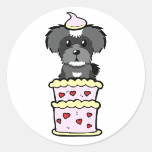 Grappige schnauzer hond springen uit een taart ronde sticker