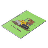 Grappige stier bestuurt bulldozer cartoon notitieboek (Linkerzijde)