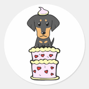 Grappige teckel hond springen uit een taart ronde sticker