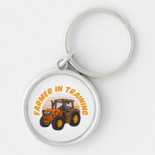Grappige toekomstige boer in opleiding tractor lan sleutelhanger