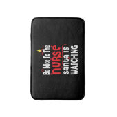 Grappige verpleegster kerst, wees aardig tegen de  badmat (Voorkant Verticaal)