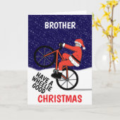 Grappige vrolijke kerstfietsende kerstman kaart (Gele Bloem)