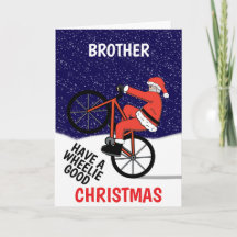 Grappige vrolijke kerstfietsende kerstman