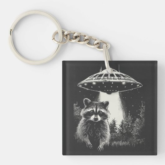 Grappige Zwart-Witte Ruimte Wasbeer UFO Sleutelhanger (Voorkant)