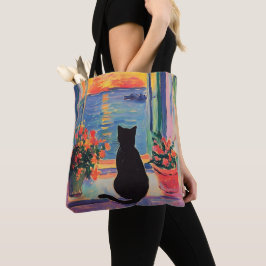 Grappige zwarte kat genietend van de zonsondergang tote bag