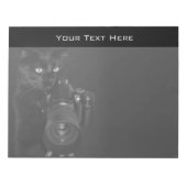 Grappige zwarte kat met de camera notitieblok (Voorkant)