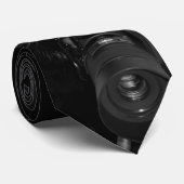 Grappige zwarte kat met de camera stropdas (Opgerold)