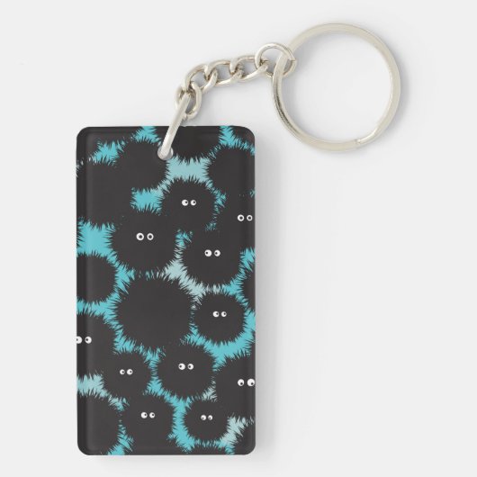 Grappige zwarte pluizige monsters sleutelhanger (achterkant)