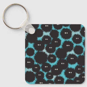 Grappige zwarte pluizige monsters sleutelhanger