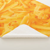 grated cheddar cheese top view sherpa deken (3/4)