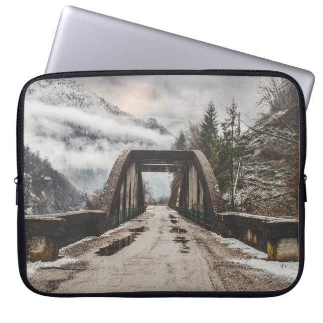 GRAY CONCRETE ARCH BRIDE BESIDE LEAFLESS TREE NEAR LAPTOP SLEEVE (Voorkant)