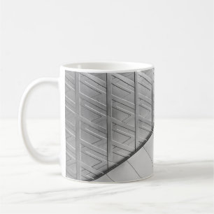 Grayscalefoto van vloeren koffiemok