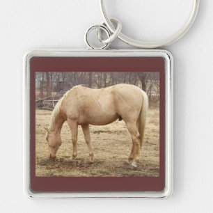 grazend palomino paard sleutelhanger
