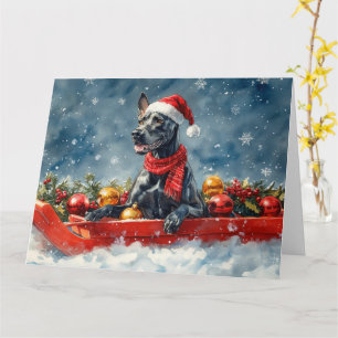 Great Dane-hond in slee laat het sneeuwen Kerstmis Kaart